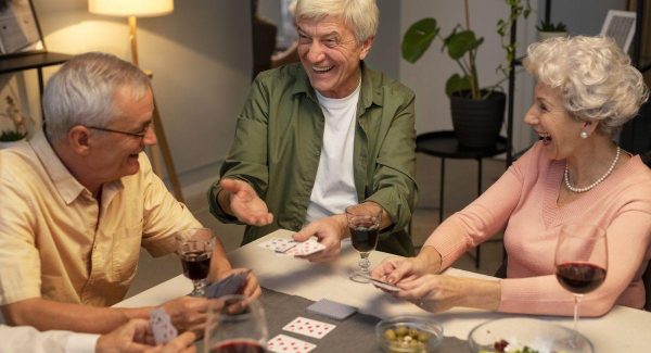 Senior friends having party night web